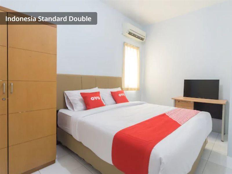 Super Oyo 2110 Rotterdam Guest House Tangerang Esterno foto